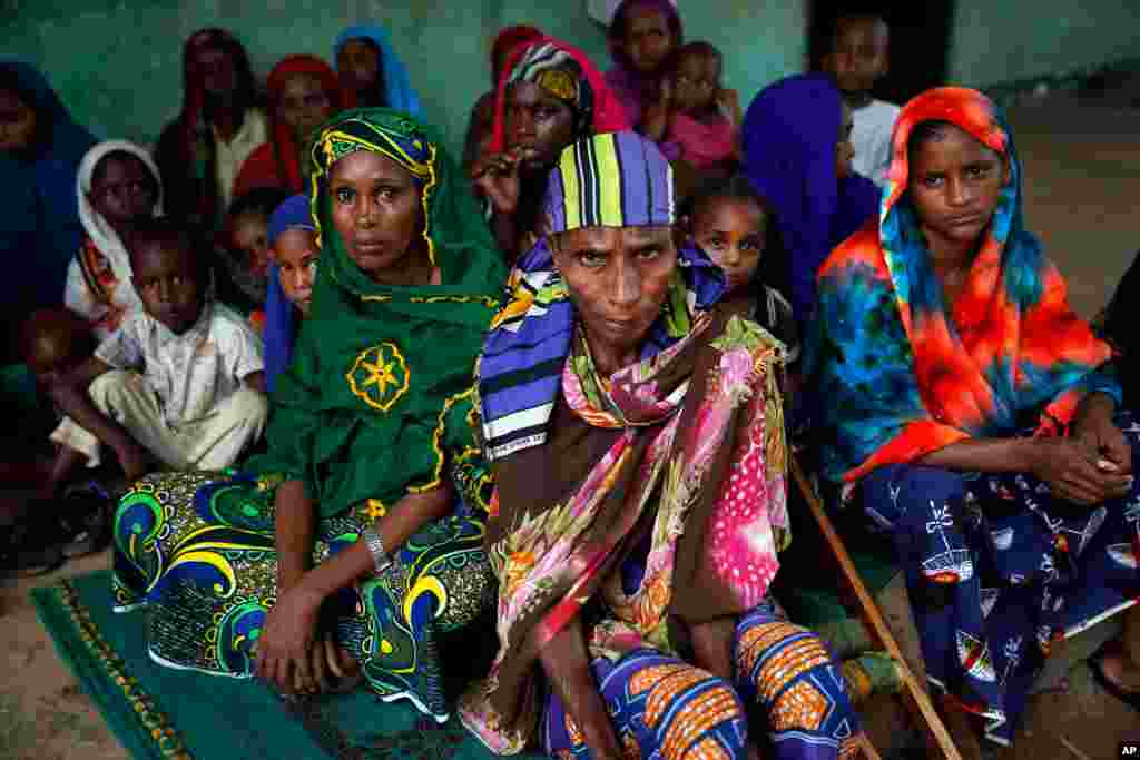 Peul women sit in a house across the Nour Islam mosque where they found refuge in Bangui, Central African Republic. More than 500 people have been killed over the past week in sectarian fighting, aid officials said.