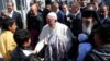 Un an après, l'intégration à petits pas pour les Syriens du pape