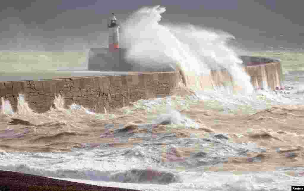 Large waves hit a sea wall in Newhaven, Britain, Oct. 20, 2021.