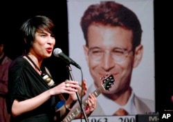 FILE - Musician Meesha Shafi performs at a tribute concert to slain journalist Daniel Pearl in Islamabad, Pakistan, Oct. 9, 2010.