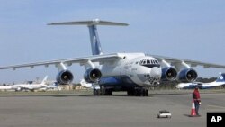 In this undated photo provided by Silkway Airlines press service on Wednesday, July 6, 2011, the IL-76TD-90SW cargo plane, similar to the one crashed in Afghanistan, is seen in an undisclosed location