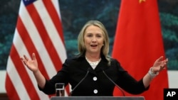FILE - U.S. Secretary of State Hillary Clinton speaks during her joint conference with Chinese Foreign Minister Yang Jiechi at the Great Hall of the People in Beijing.