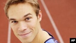 Olympian Nick Symmonds sports the Hanson Dodge Creative logo, after the company won an eBay auction on his left shoulder.