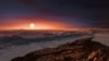 This artist’s impression shows a view of the surface of the planet Proxima b orbiting the star Proxima Centauri, the closest star to the solar system. (Credit NASA)