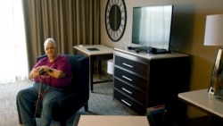 Dana Zzyym sits for a photo on October 27, 2021 in Fort Collins Colorado. Zzyym has been in a legal battle for years with the United States' government on if Zzyym can use a third gender marker on their passport. (AP Photo/Thomas Peipert)