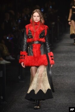 A model wears a creation for Alexander McQueen's Fall-Winter 2017-18 ready to wear fashion collection presented March 6, 2017, in Paris.