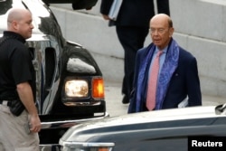 Incoming Trump administration Commerce Secretary nominee Wilbur Ross (R) departs after working a simulated crisis scenario during transition meetings at the Eisenhower Executive Office Building at the White House in Washington, Jan. 13, 2017.