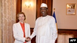 FILE - Chad's President Idriss Deby Itno (R) shakes hands with France Minister of Army Forces Florence Parly before their meeting at the presiedential palace in N'Djamena, Chad, July 31, 2017. 