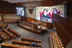 Pembicaraan Tingkat II/Pengambilan Keputusan atas RUU tentang Ibu Kota Negara menjadi Undang-Undang dalam Rapat Paripurna Ke-13 DPR RI Masa Persidangan III Tahun Sidang 2021-2022, Selasa, 18 Januari 2022. (Twitter/@DPR_RI)