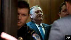 U.S. President Donald Trump's secretary of state nominee Mike Pompeo leaves a meeting on Capitol Hill in Washington, April 9, 2018.