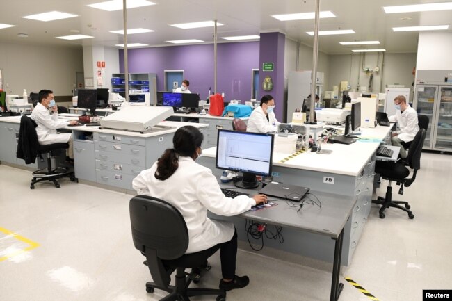 Chemists work at AstraZeneca's headquarters,