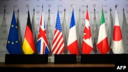 资料图：七国集团各成员国和欧盟旗帜。