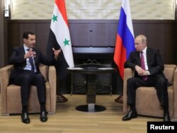 Ruski predsednik Putin sa sirijskim predsednikom Bašarom al-Asadom u Sočiju, 17. maja 2017.