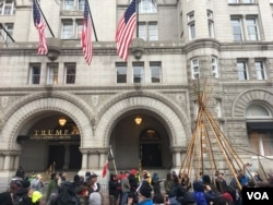 Protesters set up a tepee outside the Trump Hotel (E. Sarai/VOA)