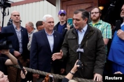 US Republican presidential candidate Ted Cruz is joined by governor Mike Pence at a campaign event at The Mill in Marion, Indiana, May 2, 2016.