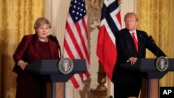 Norwegian Prime Minister Erna Solberg, speaks during a joint news conference with President Donald Trump, in the East Room of the White House in Washington, Jan. 10, 2018. 