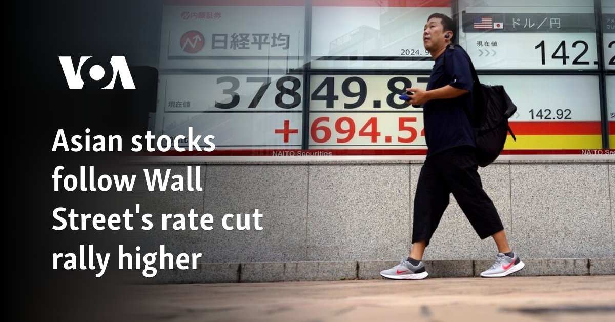 Asian stocks follow Wall Street's rate cut rally higher