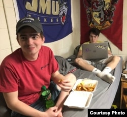 Nick Long, 19, (left) of Newport News, Virginia, with fellow student Jay Thurn, at James Madison University in Harrisonburg, Virginia.