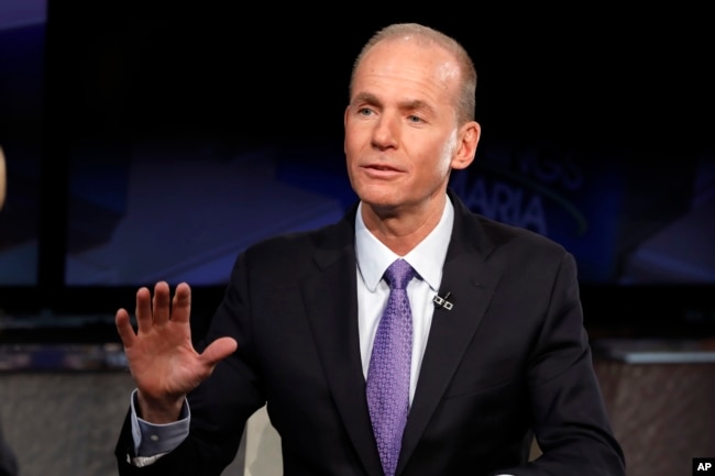 FILE - Boeing CEO Dennis Muilenburg is interviewed on the Fox Business Network, in New York, Nov. 13, 2018.