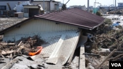 The 2011 quake and resulting tsunami waves killed an estimated 18,000 people and triggered the meltdowns of three nuclear reactors in Fukushima, Japan. (S. Herman/VOA)
