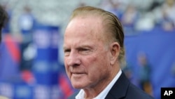FILE -Former New York Giants player Frank Gifford looks on before an NFL football game between the New York Giants and the Denver Broncos Sunday, Sept. 15, 2013, in East Rutherford, New Jersey.