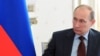 Truy bức chính trị đánh dấu năm đầu tiên Putin trở lại làm tổng thống