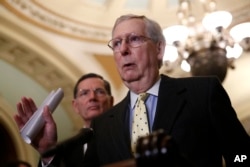 Senate Majority Leader Mitch McConnell of Kentucky speaks to members of the media following a Senate policy luncheon on Capitol Hill in Washington, April 2, 2019.