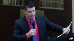 FILE - Oklahoma state Rep. John Bennett speaks on the floor of the Oklahoma House in Oklahoma City, Jan. 3, 2017.