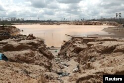 An illegal gold mining camp is seen during a Peruvian military operation to destroy illegal machinery and equipment used by wildcat miners in Madre de Dios, Peru, March 5, 2019.