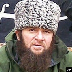 In this screen shot taken in Moscow, Wednesday, Dec. 2, 2009 a computer screen shows an undated photo of a man identified as Chechen separatist leader Doku Umarov posted on the Kavkazcenter.com site.