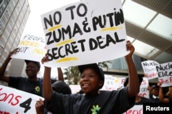 Environmental activists protest against the use of nuclear power in Durban, South Africa, Dec. 14, 2016.
