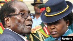 President Robert Mugabe leaves the parliament building after delivering his State Of the Nation address in Harare, Zimbabwe, Dec. 6, 2016.