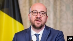 FILE - Belgian Prime Minister Charles Michel is pictured at his official residence in Brussels, March 25, 2016. Belgian government officials said Wednesday that there were “absolutely no” specific indications Michel was under a terrorist threat.