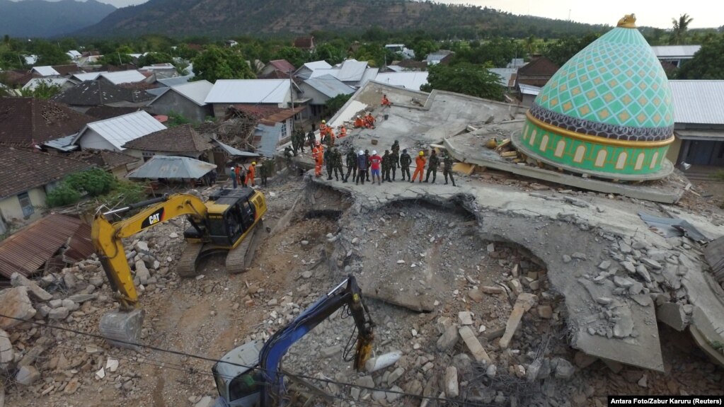 An aerial view of the collapsed Jamiul Jamaah mosque where rescue workers and soldiers search for earthquake victims in Pemenang, North Lombok, Indonesia, Aug. 8, 2018.