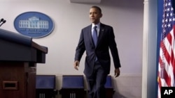 President Barack Obama approaches podium to discuss about the economy, White House, June 8, 2012.