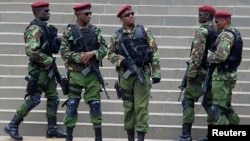 Kenyan paramilitary units take their positions during the Africa Union Peace and Security Council Summit on Terrorism, at the Kenyatta International Convention Centre, in Nairobi, Sept. 2, 2014.