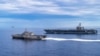 美國海軍公佈的照片顯示，一架F-35C戰鬥機從“卡爾文森”號航空母艦飛行甲板上起飛，這艘航母與“塔爾薩”號瀕海戰鬥艦正在駛過南中國海。 (2021年9月7日)