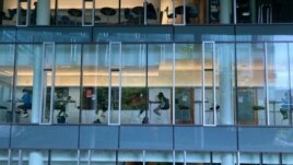 Students studying inside a building at Carnegie Mellon University.