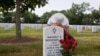 FILE - Waverly Woodson Jr. is buried at Arlington National Cemetery in Virginia, where America buries its heroes. Each May around Memorial Day, his widow, Joann, arranges the red roses her husband loved so much beside his grave. (Photo: Linda Hervieux)