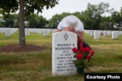 Waverly Woodson is buried at Arlington National Cemetery where American buries its heroes. . Each May around Memorial Day, his widow, Joann, arranges the red roses her husband loved so much beside his grave. (Photo: Linda Hervieux)