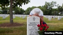 FILE - Waverly Woodson Jr. is buried at Arlington National Cemetery in Virginia, where America buries its heroes. Each May around Memorial Day, his widow, Joann, arranges the red roses her husband loved so much beside his grave. (Photo: Linda Hervieux)
