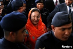 Rosmah Mansor, istri mantan Perdana Menteri Malaysia Najib Razak, tiba di pengadilan di Kuala Lumpur, Malaysia 4 Oktober 2018. (Foto: REUTERS/Lai Seng Sin)