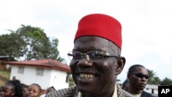 Liberian warlord-turned-presidential candidate Prince Johnson campaigns in the village of Demeh in Bomi County, in the West African country September 14, 2011.