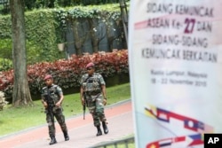 Malaysian military personnel patrol at the 27th Association of Southeast Asian Nations (ASEAN) summit in Kuala Lumpur, Malaysia, Thursday, Nov. 19, 2015.