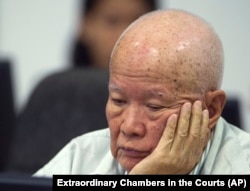 IKhieu Samphan, former Khmer Rouge head of state, sits in the court room during a hearing at the U.N.-backed war crimes tribunal in Phnom Penh, Cambodia, July 30, 2014.