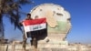 Quân đội giương cờ Iraq lên khu công ốc thành phố Ramadi 