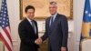 Kosovo's president Hashim Thaci, right, shakes hands with Hoyt Brian Yee, Deputy Assistant Secretary for European and Eurasian Affairs, responsible for U.S. relations with the countries of Central Europe and South Central Europe, Oct. 25, 2017, in Kosovo capital Pristina.