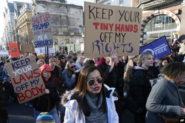 Demonstrators take part in the Women's March on London, following the Inauguration of U.S. President Donald Trump, in London, Jan. 21, 2016.