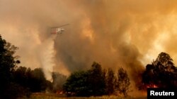 A fire bombing helicopter works