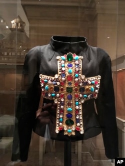 A jacket by French designer Christian Lacroix, is on display at the Metropolitan Museum of Art in “Heavenly Bodies: Fashion and the Catholic Imagination,” the spring fashion exhibit at the museum’s Costume Institute, May 5, 2018.